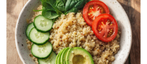cooked quinoa topped with colorful vegetables