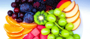 A beautifully arranged plate of colorful fresh fruits