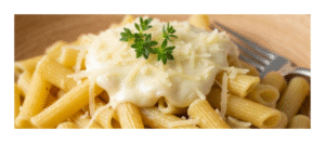 Creamy homemade pasta served with cheese and herbs”